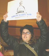 Participant at Prevention Now Rally holding sign